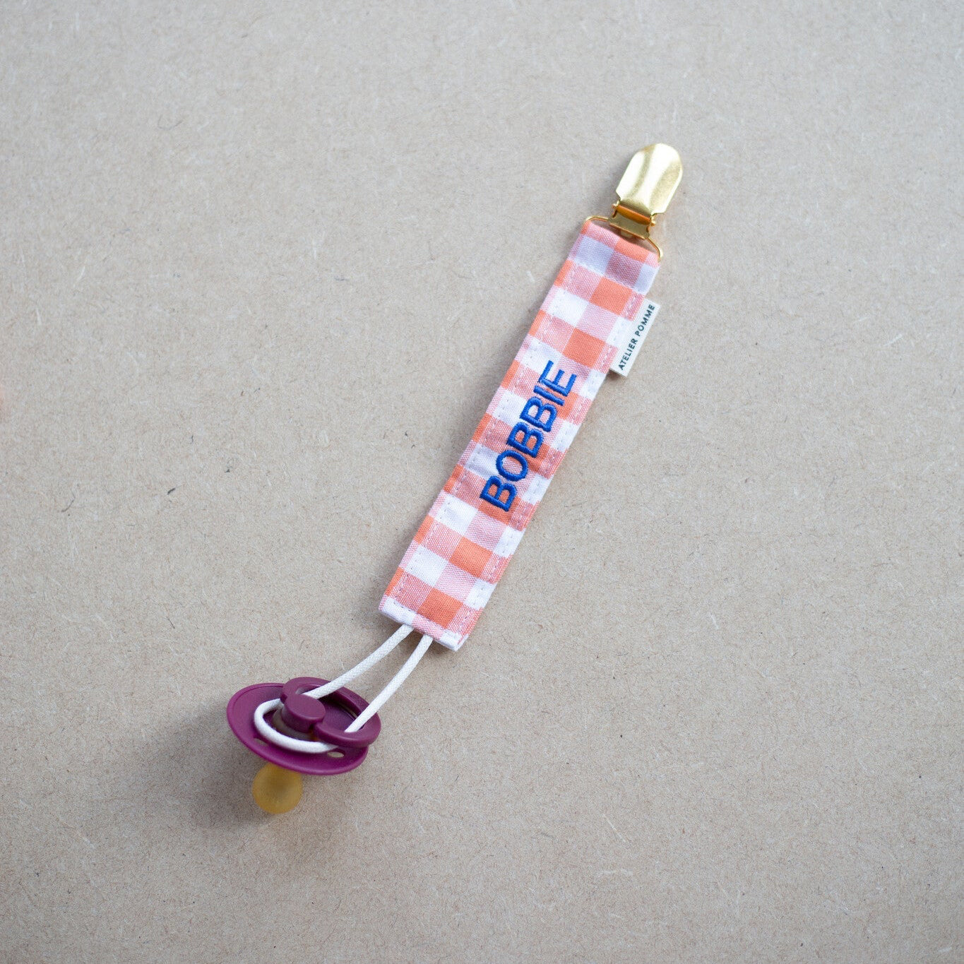 PACIFIER CORD CHECKED | OOPSY ORANGE